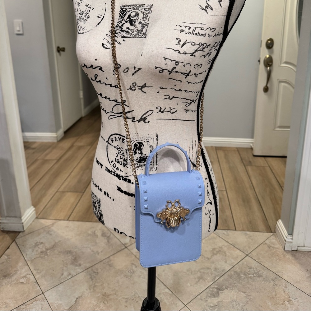 Elegant Blue Crossbody Bag with Bee Accent